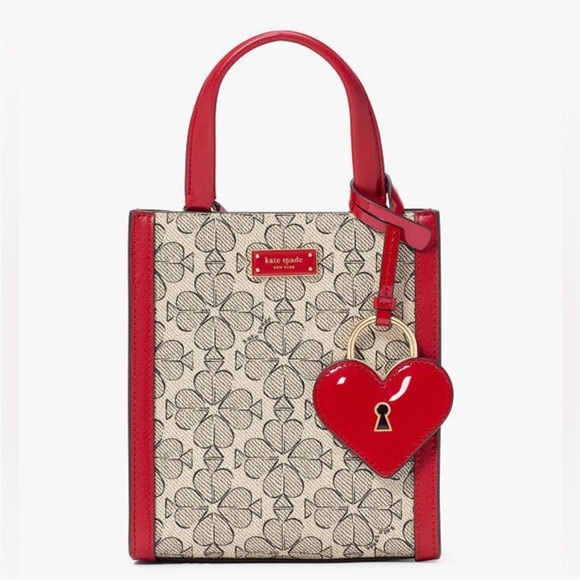 kate spade Handbags - NWT Kate Spade flower coated canvas Manhattan mini tote